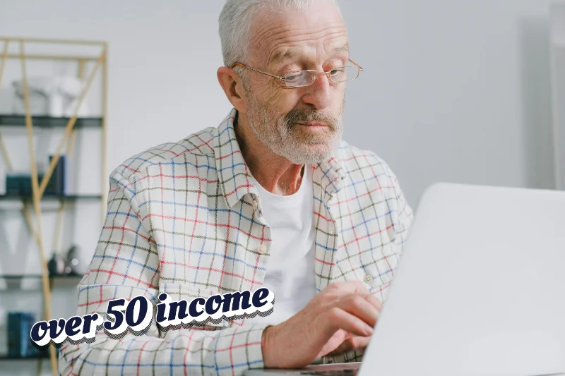 Middle-aged person working on laptop