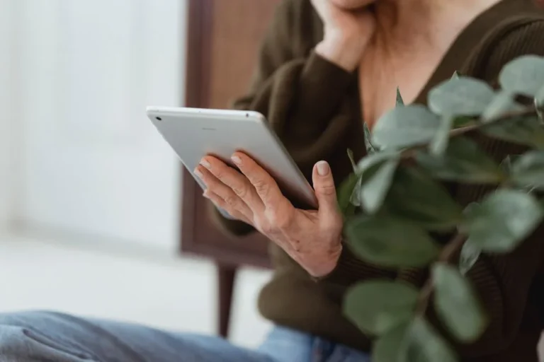 a person holding a tablet