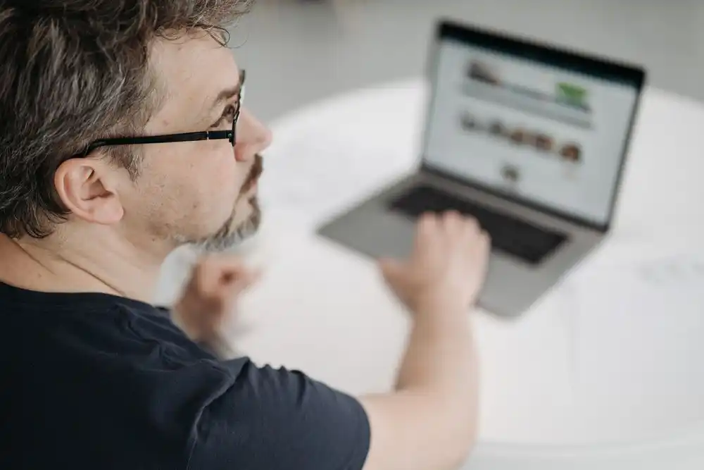 A man searching remote jobs for people in their 50s