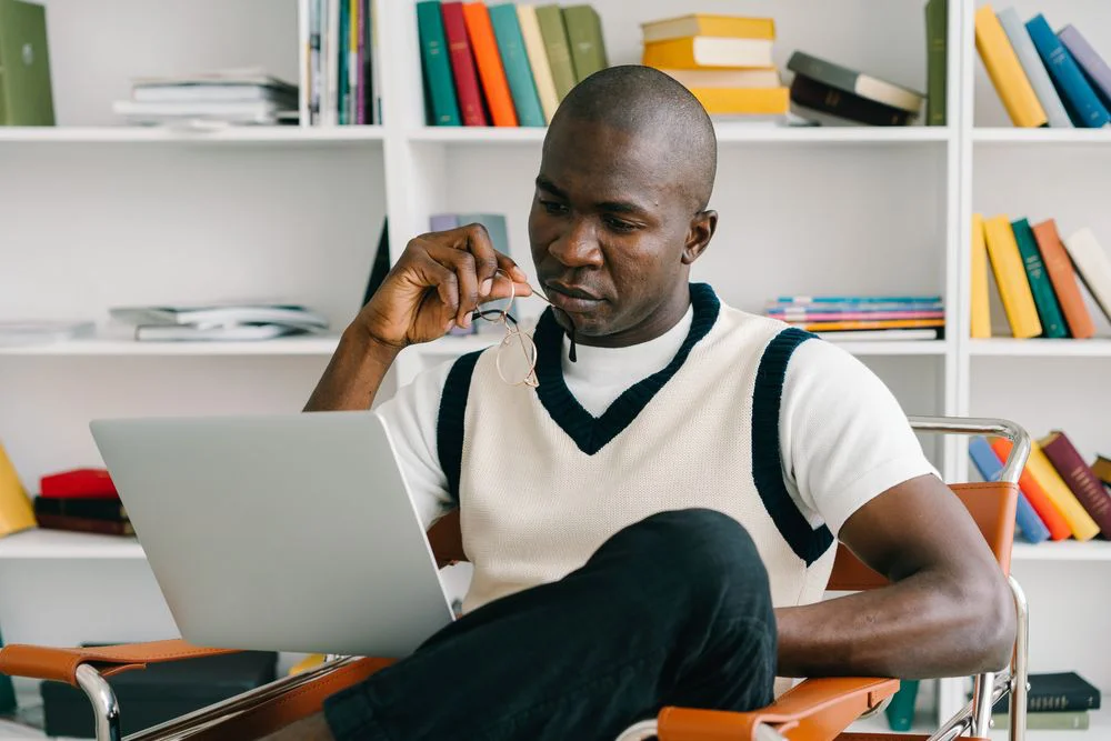 a person learning to sell digital products online over 50