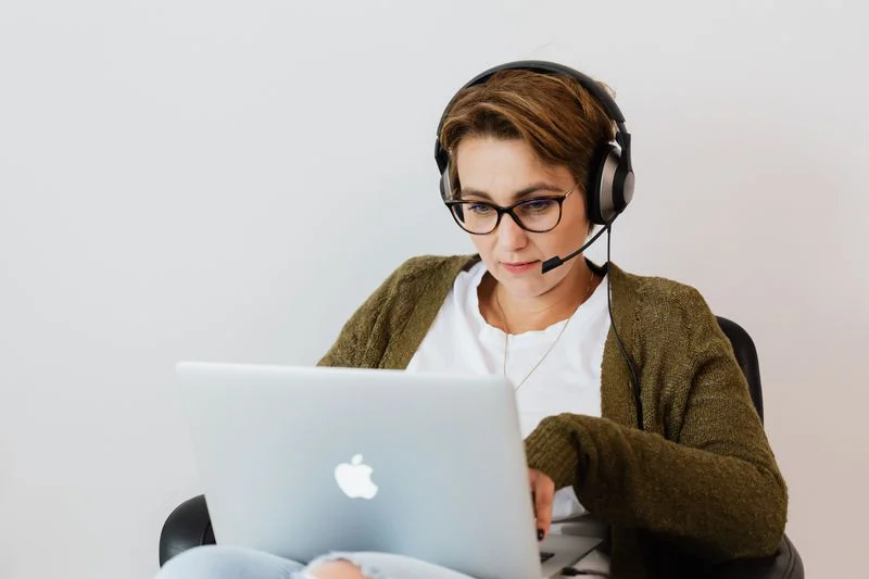 a woman using a laptop for work
